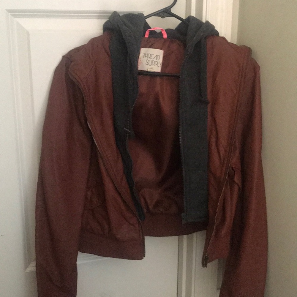 Faux leather coat with hooded sweatshirt lining